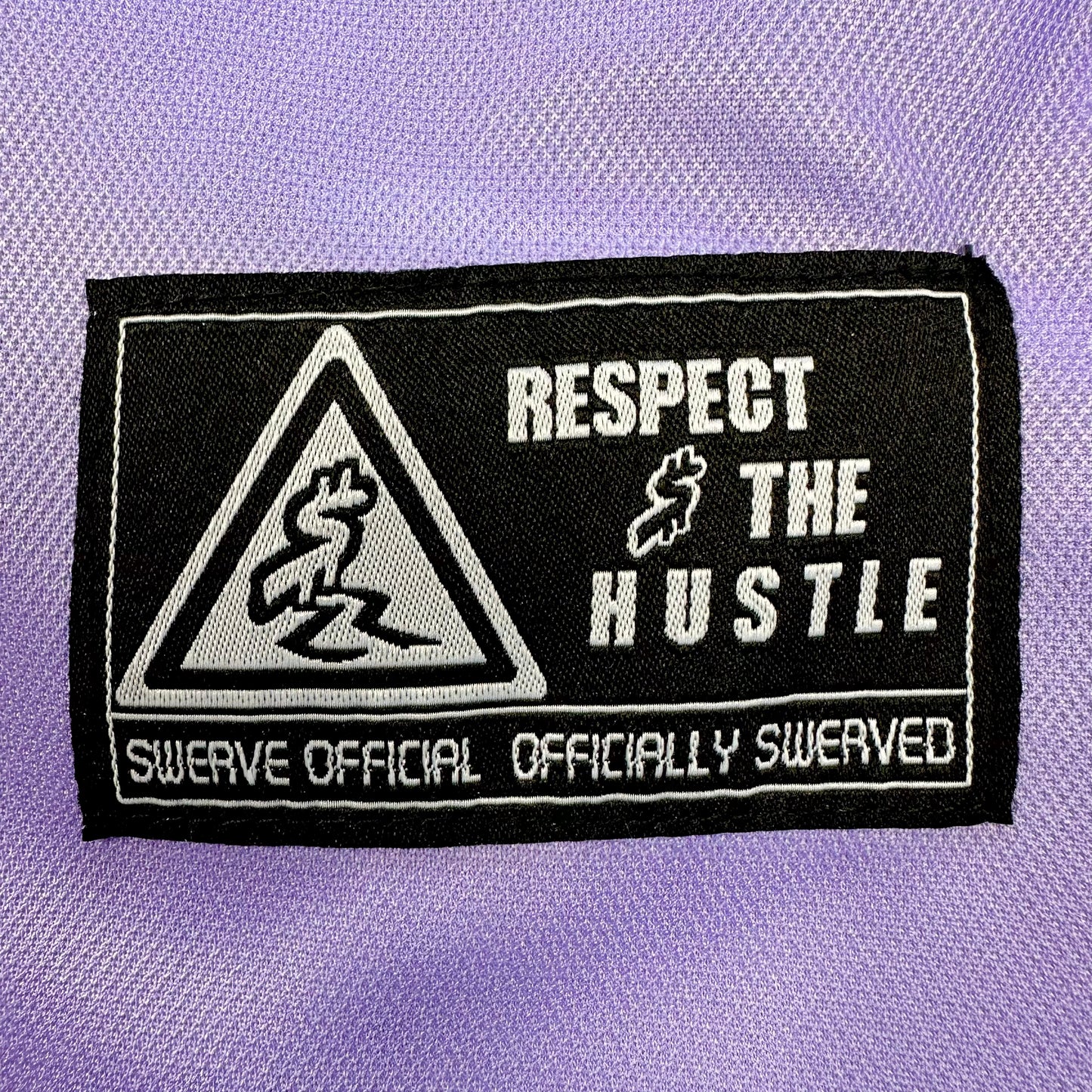 PURPLE RESPECT THE HUSTLE SHORTS